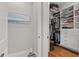 Spacious walk-in closet features custom storage solutions for optimal organization at 2087 Flora Pass Pl, Kissimmee, FL 34747