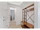 Entryway features storage and hooks for coats and shoes, creating an organized space at 2099 Derwent Dr, Davenport, FL 33896