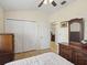 Bedroom featuring tiled floors, large closets, and neutral color scheme at 2200 Pine Needle Trl, Kissimmee, FL 34746