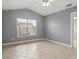 Bedroom with light tile floors and ceiling fan at 2200 Pine Needle Trl, Kissimmee, FL 34746