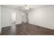 Empty bedroom features hard surface floors and standard closet and en suite bathroom at 2723 Beacon St, Eustis, FL 32726