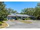 Well-maintained townhome exterior showcasing neat landscaping and ample parking space at 2723 Beacon St, Eustis, FL 32726