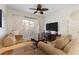 Cozy living room with large windows, ceiling fan, and comfortable couches at 2784 Almaton Loop # 301, Kissimmee, FL 34747