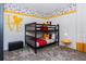 Charming bedroom features bunk beds and playful Mickey Mouse themed decor at 2807 Bookmark Dr, Kissimmee, FL 34746