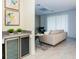 Open living space with a cozy seating area, modern mini bar, and lots of natural light at 2807 Bookmark Dr, Kissimmee, FL 34746