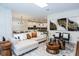 Spacious living area with open floor plan into the kitchen, and elegant decor at 2807 Bookmark Dr, Kissimmee, FL 34746