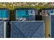 Aerial view of a screened-in pool and hot tub with lounge chairs on the pool deck at 2807 Bookmark Dr, Kissimmee, FL 34746