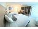 Bright hotel room featuring two double beds, workspace, closet and flatscreen TV at 3000 Maingate Ln # 227, Kissimmee, FL 34747