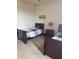 Shared bedroom featuring two twin-sized beds with coordinating decor and carpet flooring at 3026 Bella Vista Dr, Davenport, FL 33897