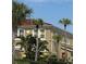 View of the exterior elevation of the property showcasing landscaping at 3026 Bella Vista Dr, Davenport, FL 33897