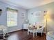 Bright living room furnished with white wicker furniture, ideal for relaxation at 3252 Noah St, Deltona, FL 32738