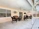 Covered patio featuring a seating area with wicker furniture and a ceiling fan at 3252 Noah St, Deltona, FL 32738