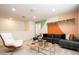 Comfortable living room featuring stylish seating, modern decor, and a cozy atmosphere at 3428 Lilac Way, Davenport, FL 33897