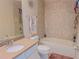Inviting bathroom showcasing a vanity, toilet, and bathtub-shower combo at 3593 Brighton Park Cir, Belle Isle, FL 32812