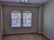 Bright room with windows overlooking scenic views and neutral carpet at 3593 Brighton Park Cir, Belle Isle, FL 32812