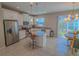 Spacious kitchen with stainless steel appliances, granite countertops, and a convenient center island with seating at 3593 Brighton Park Cir, Belle Isle, FL 32812