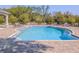 A private swimming pool surrounded by a brick patio and a lush green landscape at 3593 Brighton Park Cir, Belle Isle, FL 32812