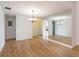 Dining room with tile floors, chandelier, and mirror walls, perfect for entertaining guests at 409 Oak Haven Dr # 409, Altamonte Springs, FL 32701