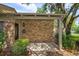 Cozy front porch with seating area, decorative chairs, and brick accents at 409 Oak Haven Dr # 409, Altamonte Springs, FL 32701