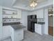 Lovely kitchen with white cabinets, granite countertops, stainless steel appliances, and tile flooring at 409 Oak Haven Dr # 409, Altamonte Springs, FL 32701
