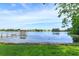 Scenic view of the lake with a charming gazebo and a variety of aquatic birds in a natural setting at 409 Oak Haven Dr # 409, Altamonte Springs, FL 32701