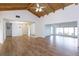 Open living space with tile floors, vaulted ceiling, and bright light from the adjacent rooms at 409 Oak Haven Dr # 409, Altamonte Springs, FL 32701