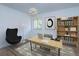 Bright home office with stylish decor, a modern desk, comfortable seating, and a large window at 409 Oak Haven Dr # 409, Altamonte Springs, FL 32701