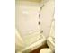 Bright bathroom featuring a white tub with shower and useful corner shelving at 4268 Lake Underhill Rd # 4, Orlando, FL 32803