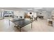 Spacious game room with ping pong table, billiards table, seating, and tiled flooring throughout at 4268 Lake Underhill Rd # 4, Orlando, FL 32803