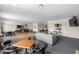 This is a large lounge area with multiple tables and couches for many people to sit and relax at 4268 Lake Underhill Rd # 4, Orlando, FL 32803