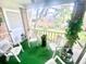 Relaxing screened patio with comfortable seating, offering serene outdoor space and views at 4268 Lake Underhill Rd # 4, Orlando, FL 32803