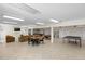 Large recreation room with tables, seating, and entertainment options at 4268 Lake Underhill Rd # 4, Orlando, FL 32803