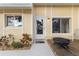 Charming home exterior featuring a welcoming front entrance, stone decorations and a cozy porch at 4907 Lindsay Ct, Orlando, FL 32821