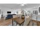 Open floor plan connecting living, dining, and kitchen areas with modern finishes at 4907 Lindsay Ct, Orlando, FL 32821