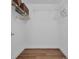 Spacious walk-in closet with shelving for optimal storage and organization at 4907 Lindsay Ct, Orlando, FL 32821