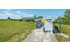 Elevated wooden boardwalk for pedestrian traffic with beautiful views of the surrounding natural landscape and greenery at 5055 Coveview Dr, St Cloud, FL 34771