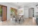Cozy breakfast nook featuring modern lighting fixture and sliding doors to the exterior at 5055 Coveview Dr, St Cloud, FL 34771