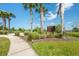 Seiden Park featuring lush landscaping, walking path and a welcoming sign, inviting residents for outdoor enjoyment at 5055 Coveview Dr, St Cloud, FL 34771