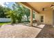 Large brick patio featuring a porch swing and an outdoor living space at 5055 Coveview Dr, St Cloud, FL 34771