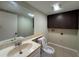 The bathroom features a large mirror and vanity with modern fixtures at 5268 Middle Ct # 111, Orlando, FL 32811