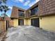 This home has a two-story floor plan with 2nd story balconies and a private courtyard at 5268 Middle Ct # 111, Orlando, FL 32811