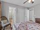 Comfortable bedroom with ensuite bath access and generous closet space at 5325 Cypress Reserve Pl, Winter Park, FL 32792