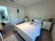 Cozy bedroom featuring ample space, natural light and neutral décor at 5771 Mangrove Cove Ave, Winter Garden, FL 34787