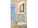 Clean bathroom featuring modern vanity, updated fixtures, mirror, and a nearby toilet at 5830 Beechmont Blvd, Orlando, FL 32808