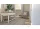 Bright office with a large desk, comfortable chair, and a decorative plant creates an ideal workspace at 5830 Beechmont Blvd, Orlando, FL 32808