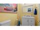 Tropical style bathroom with coastal painting and modern fixtures at 610 Chestnut Oak Cir # 114, Altamonte Springs, FL 32701