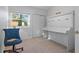 Cozy bedroom featuring a stylish murphy bed, a window with natural light, and a modern work desk at 610 Chestnut Oak Cir # 114, Altamonte Springs, FL 32701