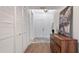Bright entryway featuring ample closet space and a stylish wooden dresser with contemporary decor at 610 Chestnut Oak Cir # 114, Altamonte Springs, FL 32701