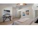Spacious main bedroom featuring ample closet space, contemporary art, and cozy bedroom furnishings at 610 Chestnut Oak Cir # 114, Altamonte Springs, FL 32701