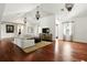 Expansive living room featuring hardwood floors, high ceilings, and ample natural light at 6120 Payne Stewart Dr, Windermere, FL 34786